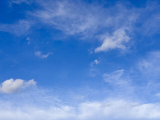 Layered Cumulus and Altocumulus Clouds over Bright Blue Sky