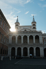 Obraz premium Archbasilica of Saint John Lateran facade and Lateran district with piazza palace and Porta San Giovanni ancient walls Rome Italy exterior architecture landmark. High quality photo