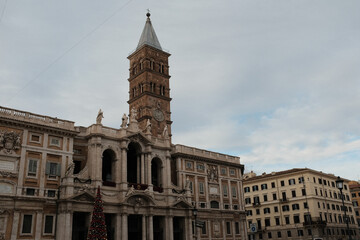 Fototapeta premium Basilica of Saint Mary Major exterior facade with Christmas tree baroque architecture city square Rome Italy daytime. High quality photo
