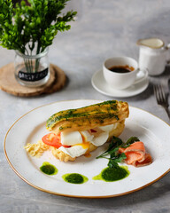 Enjoy a gourmet breakfast with eggs, smoked salmon, and a
