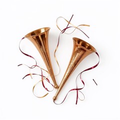 Two golden party horns with colorful streamers for New Year celebration  