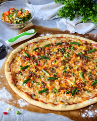 Enjoy some Delicious Homemade Pizza topped with Fresh Vegetables and