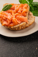 sandwich salmon smoked fish open sandwich delicious fresh portion size natural product tasty snack fresh delicious gourmet food background on the table rustic top view copy space pescetarian diet