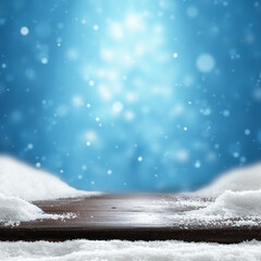 Wooden surface covered with snow with empty copy space for product placement with blurred dark blue...