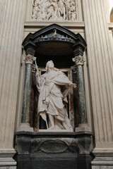 Archbasilica of Saint John Lateran Rome exterior facade and grand baroque interior with golden coffered ceiling vast nave marble statues side chapels ornate altar apse and dome Catholic basilica © Thao