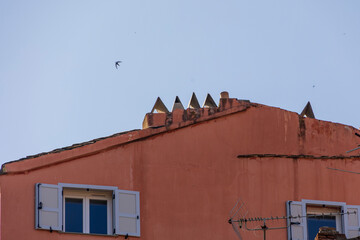 Rooftop details with chimneys in Bastia, France, Corsica, Bastia, 20 June 2025