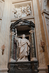 Archbasilica of Saint John Lateran Rome exterior facade and grand baroque interior with golden coffered ceiling vast nave marble statues side chapels ornate altar apse and dome Catholic basilica © Thao