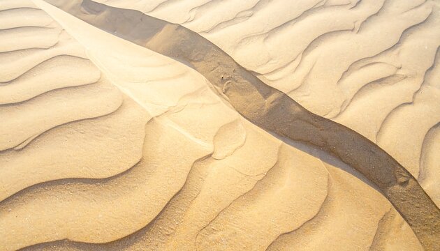 Desert sand patterns illuminated by the sun