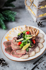 Savory Gourmet Assorted Meats Platter Artfully Arranged with Fresh Greens