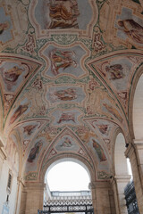 Archbasilica of Saint John Lateran Rome exterior facade and grand baroque interior with golden coffered ceiling vast nave marble statues side chapels ornate altar apse and dome Catholic basilica © Thao