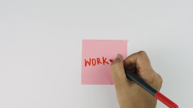a woman's hand writing WORKOUT with red marker on post it note, Daily self affirmations, healthy lifestyle and exercise concept stock video background , pr res 422