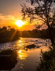 Golden sunset over a river