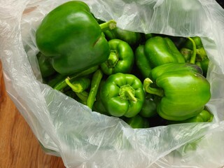 Red green chili.hot spicy.Condiment.Fresh chilli. Organic green bell peppers in market place. Chilli. Fresh green capsicum piled on the market. Food backgroumd. Harvest.