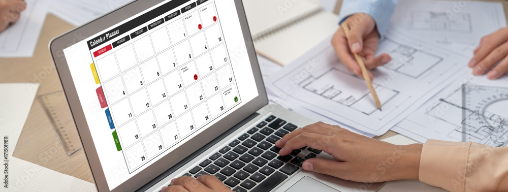 Poster calendar on computer software application for brisk schedule planning for personal organizer and onl