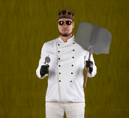 chef with a crown in a white suit on a yellow background
