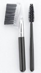 Two makeup brushes, angled and round