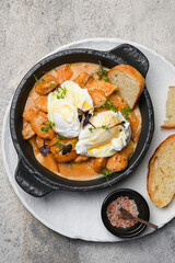 A Delicious Chicken and Egg Dish Cooked in a Black