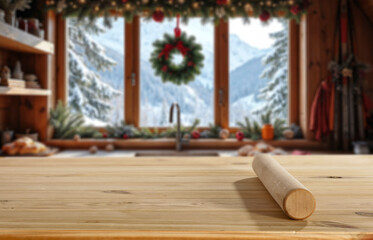 Empty wooden table with copy space for product placement in cozy alpine kitchen interior and window overlooking snowy trees and winter landscape. Seasonal advertising, home comfort, winter holidays.