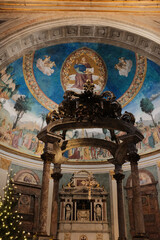 Basilica of the Holy Cross in Jerusalem Rome apse with mosaic baldachin and nativity scene Christmas decorations ornate Catholic church interior editorial use only. High quality photo © Thao