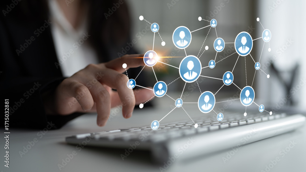 Poster a modern concept showing a hand interacting with a keyboard while a network of human icons appears, 