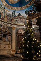 Basilica of the Holy Cross in Jerusalem Rome apse with mosaic baldachin and nativity scene Christmas decorations ornate Catholic church interior editorial use only. High quality photo © Thao