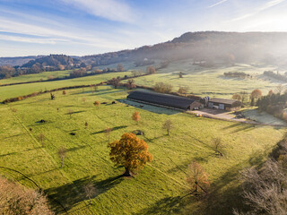 A drone view of countryside at dawn