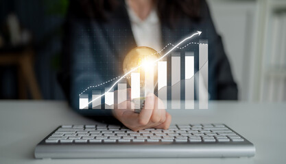 A business professional holds a light bulb representing innovation, while a growth chart emphasizes success strategies in a modern office environment. Impute