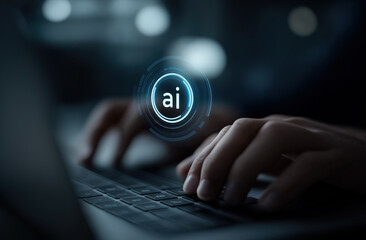 Hands typing on keyboard with illuminated artificial intelligence icon hovering above fingertips.