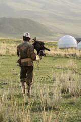 golden eagle with eagle hunter