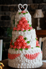 Elegant Three-Tier Wedding Cake with Coral Roses and Swirl Frosting, Heart Topper, Classic Celebration, Romantic Decor, White and Pink Hues
