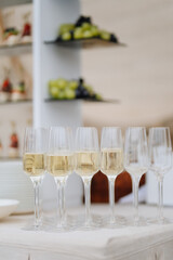 Elegant champagne glasses ready for celebration at luxury outdoor event