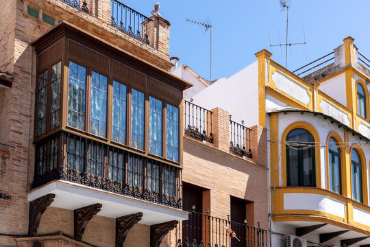 Marchena, Andalusia, Spain. 4 September 2025. View of narrow street leading to red and white clock tower