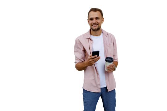 Smiling man standing with smartphone and coffee cup, enjoying casual social media, communicating on transparent background - Powered by Adobe