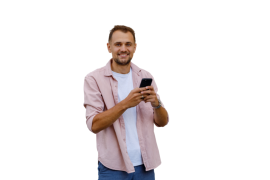 Young man smiling and communicating using mobile phone, enjoying modern technology with transparent background