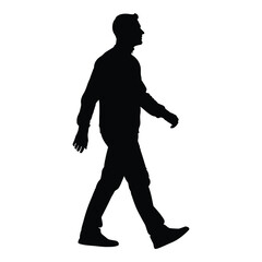A man walking with a determined stride captured in black silhouette