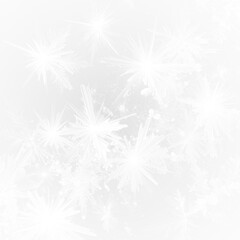 Abstract winter background with frosty snowflakes and icy particles.