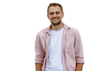 Young man smiling at camera, showing confidence and happiness. Wearing a casual outfit, feeling friendly and approachable