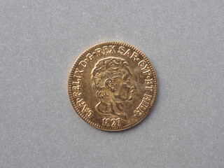 Five liras gold coin obverse showing King Charles Felix