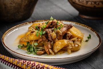 Roasted potatoes with chanterelle mushrooms.
