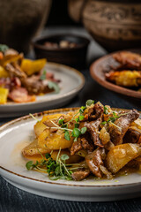 Rustic potatoes with chanterelle mushrooms and herbs.