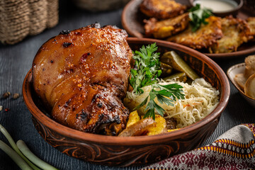 Traditional roasted pork knuckle with sauerkraut.