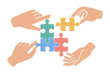 Hands assembling colorful puzzle pieces