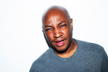 Confused gentleman on white background