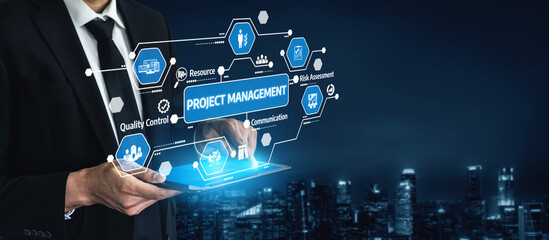 A business professional engages with a digital tablet displaying project management tools in a modern urban setting, showcasing advanced technology and innovative solutions. Tessel