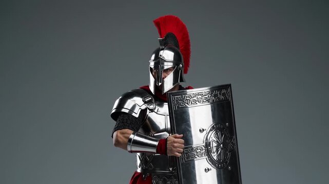 Historical reenactor showcases ancient warrior skills in a studio setting