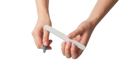 Close-up of hands holding a nail file.  A person's hands are positioned to use a white nail file.  Light skin tone