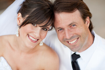 Happy, Young Bride and Groom Smiling Together - Portrait