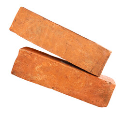 Side view of two cracked old red or orange bricks in stack isolated with clipping path in png file format