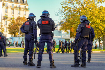french armored police and Gendarmerie  marching during a strike