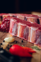 raw meat on a grill